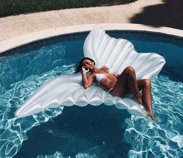 White angel wings floating row White angel wings floating row